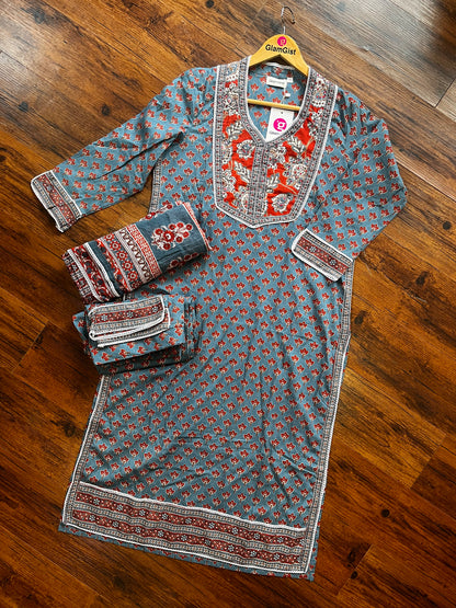 Blue kurti set with red and white accents